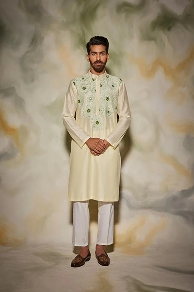 Pastel yellow with mint green thread and cutdana embroidered sunray kurta